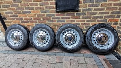 4 x Genuine early 105 15" wheels with hubcaps and nearly new