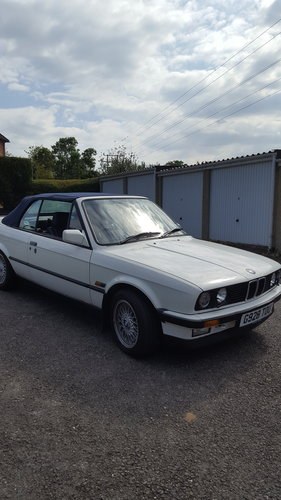 1989 BMW White with blue canvas roof convertible For Sale