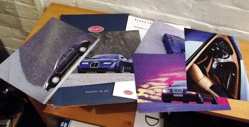 2000 bugatti sales brochure and framed christies auctin poster 90 In vendita