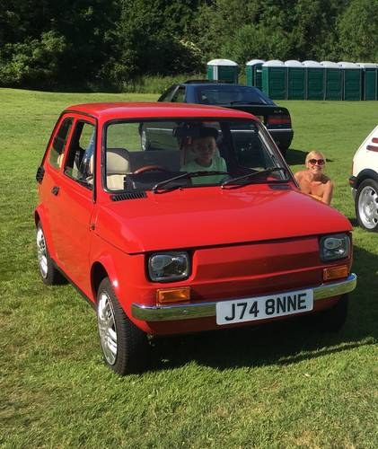 1991 Fiat 126 with  cream leather interior piped red SOLD
