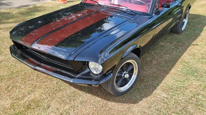 1967 Mustang Fastback Black with ghost stripes and a 4 speed