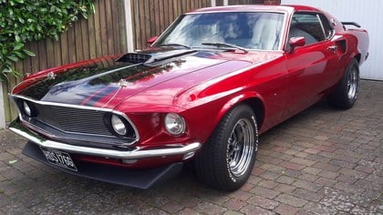 1969 Cranberry Red Fastback 302 with AOD transmission