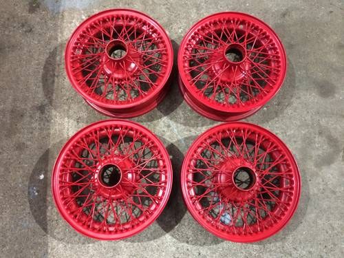 1950 4 used Jaguar XK wire wheels in red SOLD