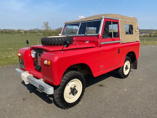 1963 Land Rover IIA in Poppy Red with a grey interior SOLD