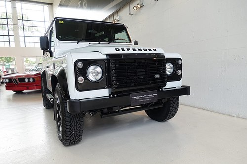 2016 Super low kilometres, Fuji White over black cloth interior SOLD