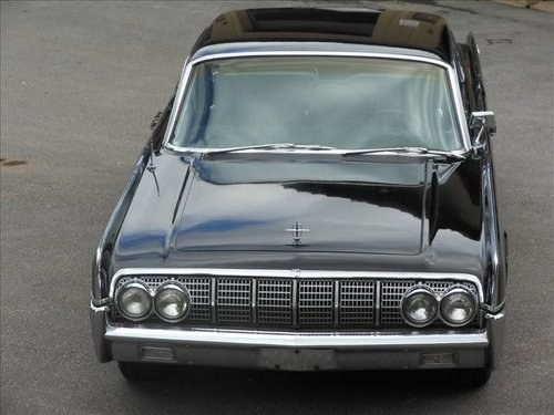 1964 Lincoln Continental 4 door sedan.Triple Black SOLD