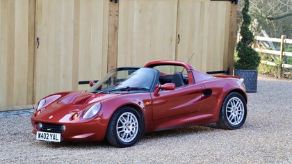 Lotus Elise S1, 2000.   Ruby red metallic with black leather