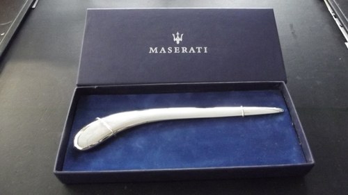 0000 MASERATI TYRES, CUFFLINKS, LETTER OPENER FOR SALE For Sale