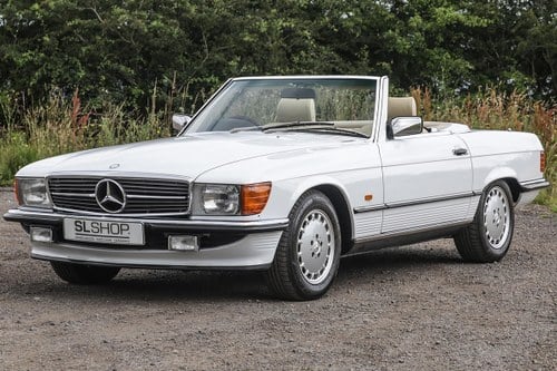 1988 MERCEDES-BENZ 300SL (R107) #2299 ARCTIC WHITE WITH BEIGE LEA SOLD