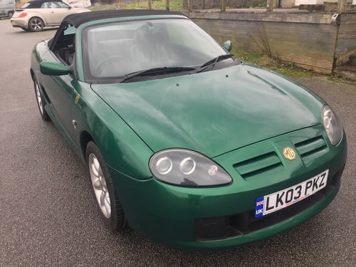 2003 MG TF in rare Le Mans green with black leather .