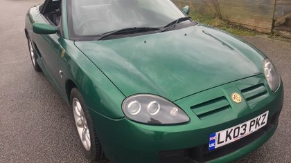 2003 MG TF  in rare Le Mans green with black leather .