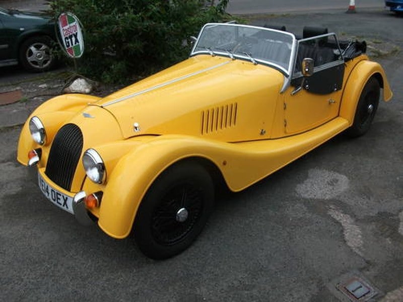 2014 4/4 two seater Yellow with black leather