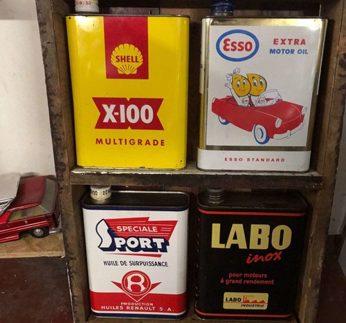 A Display of New Old Stock European Oil Cans For Sale by Auction