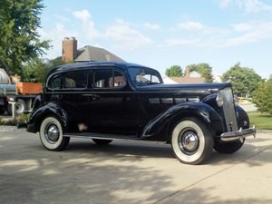 1937 Packard One Twenty Touring Sedan  For Sale by Auction