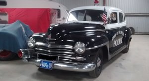 1948 PLYMOUTH P15 DELUXE POLICE SHOW CAR SOLD