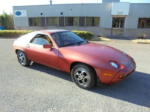 PORSCHE 928 S1 AUTO LHD COUPE(1983) MET RED 99% RUSTFREE  SOLD