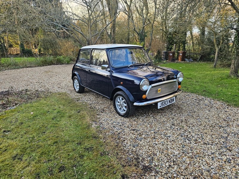 1991 J Rover Mini 1000 City E manual. Exceptional.
