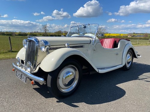 1952 Singer 4AD Roadster white with red interior. SOLD