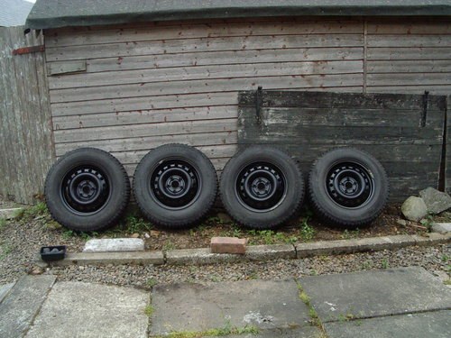 SOLDSet of Steel wheels fitted with off-road tyres For Sale