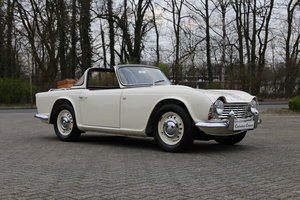 1963 An uncompromising frame off TR4 restoration with Surrey Top SOLD