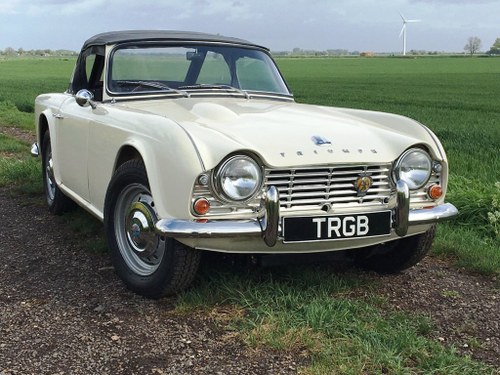TR4 1963 WHITE WITH BLACK INTERIOR. SOLD