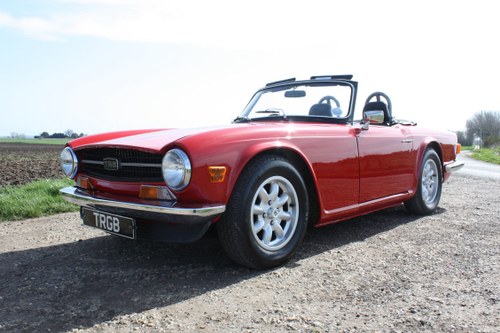 1972 TRIUMPH TR6 SIGNAL RED WITH BLACK INTERIOR. SOLD