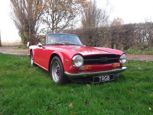 TR6 1974 RED WITH OVERDRIVE. FULL BODY OFF CHASSIS RESTORATI VERKAUFT