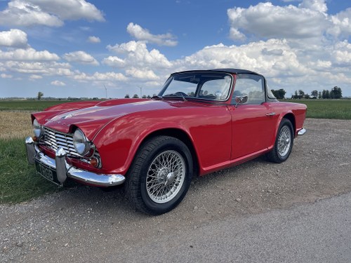 1963 TRIUMPH TR4 WITH OVERDRIVE AND SURREY BACK LIGHT SOLD