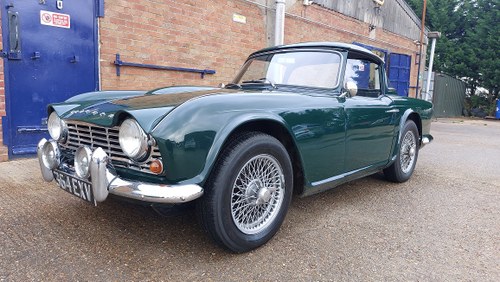 1962 TRIUMPH TR4 WITH OVERDRIVE AND SURREY TOP SOLD