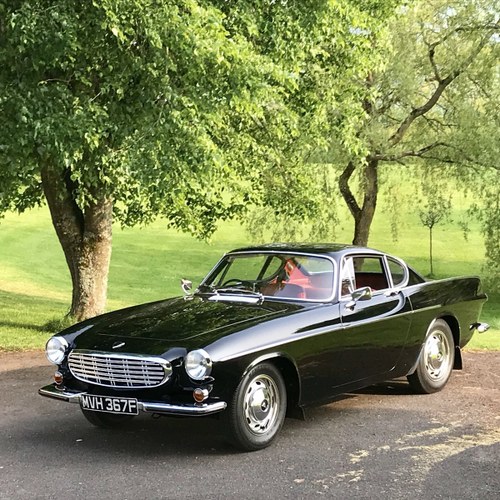 Volvo 1800S. Stunning Black with Red Leather SOLD