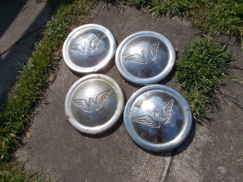 1961 Winged W wheel trims For Sale