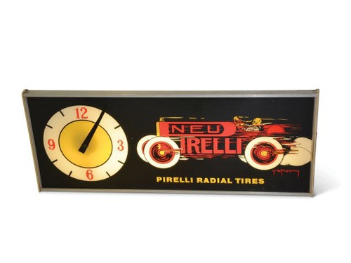 "Pirelli Radial Tires" with Race Car Plastic Lighted Clock For Sale by Auction