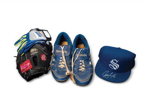 Juan Gonzlez Autographed Hat, Mitt, and Game Worn Cleats For Sale by Auction