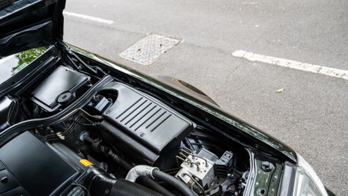 1986 Mercedes-Benz 300SL R107 till salu (bild 369 av 396)