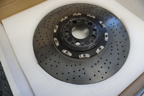 FOUR MCLAREN SENNA BRAKE DISCS AND PIRELLI P ZERO TROFEO R VENDU