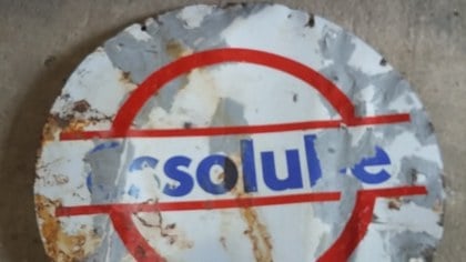 Double sided Essolube motor oil enamel circular sign dameged