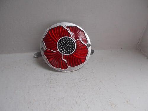 2022 POPPY GRILLE BADGE UNUSED WITH FIXINGS  CHROME AND ENAMEL SOLD